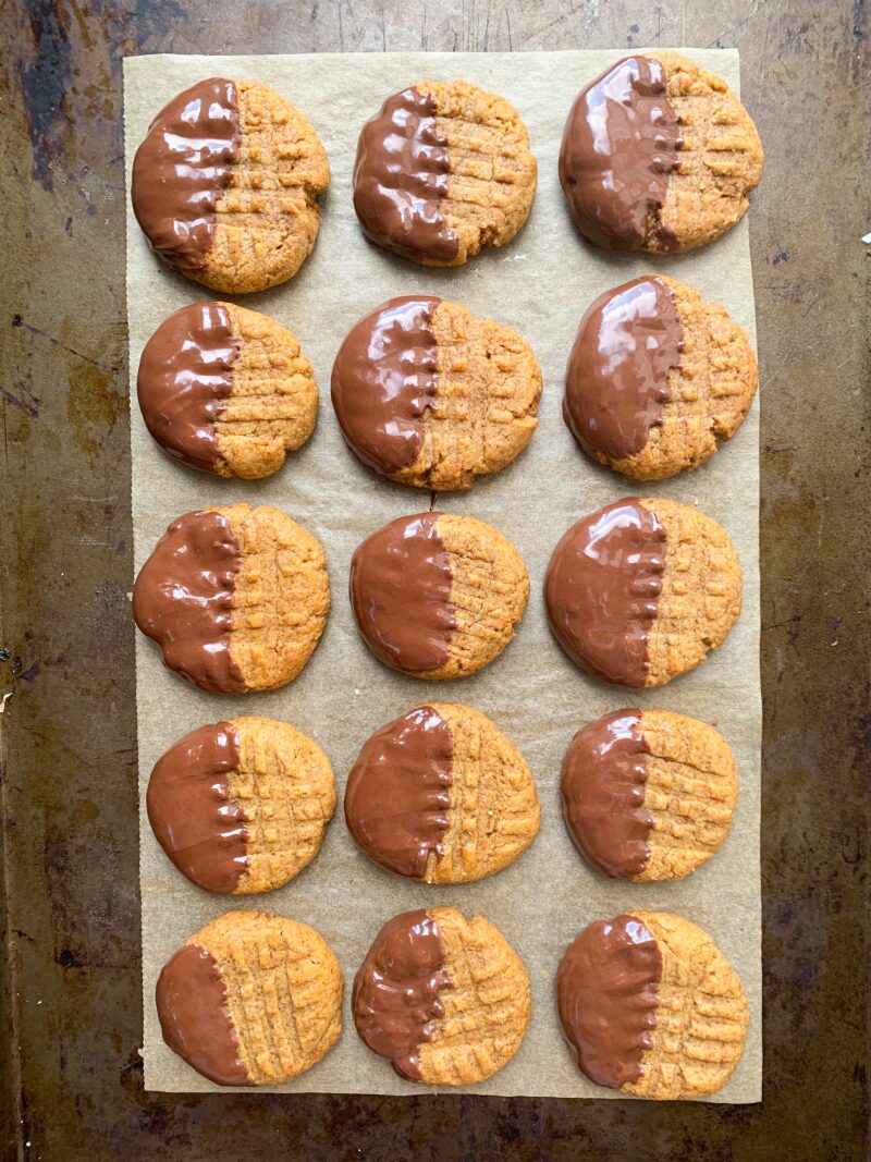 Chocolate dipped flourless cookies.
