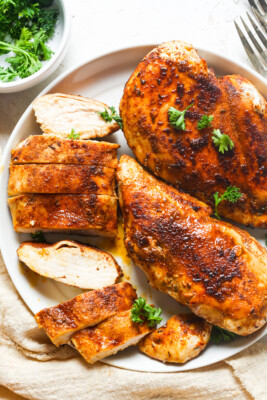 Slices of blackened chicken.