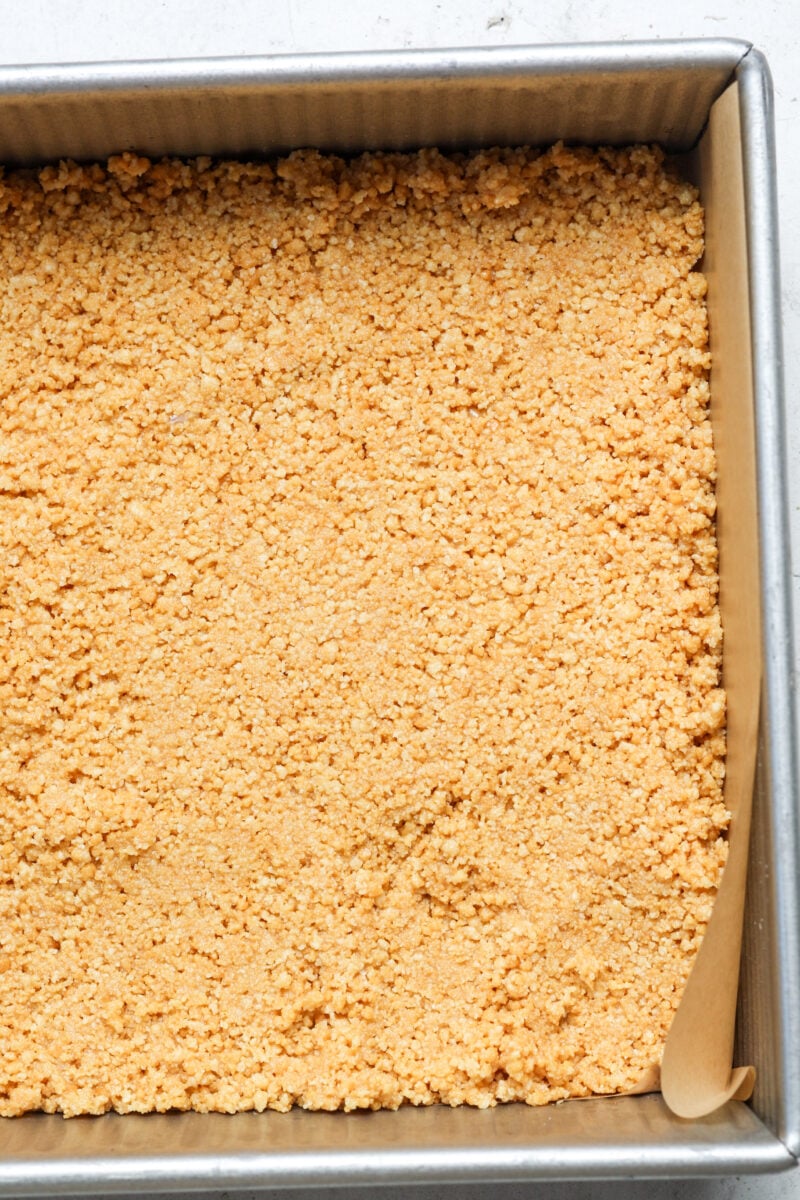 Shortbread crust pressed in pan.