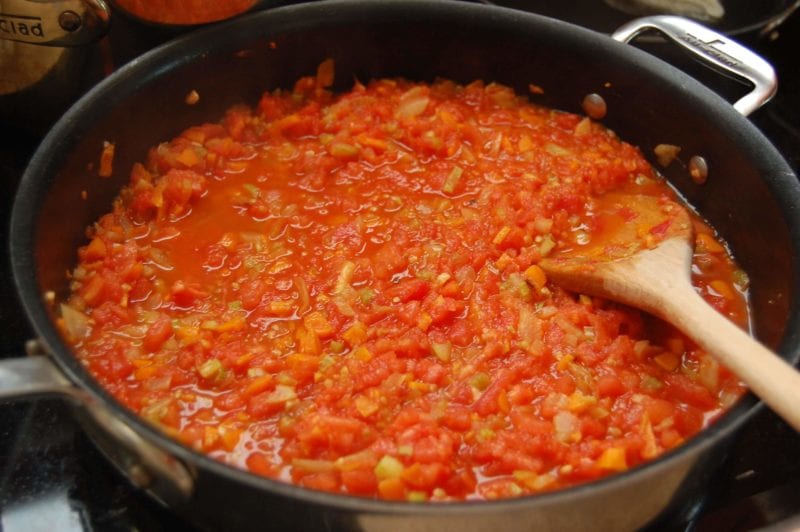 Homemade spaghetti sauce in a pot on the oven. 